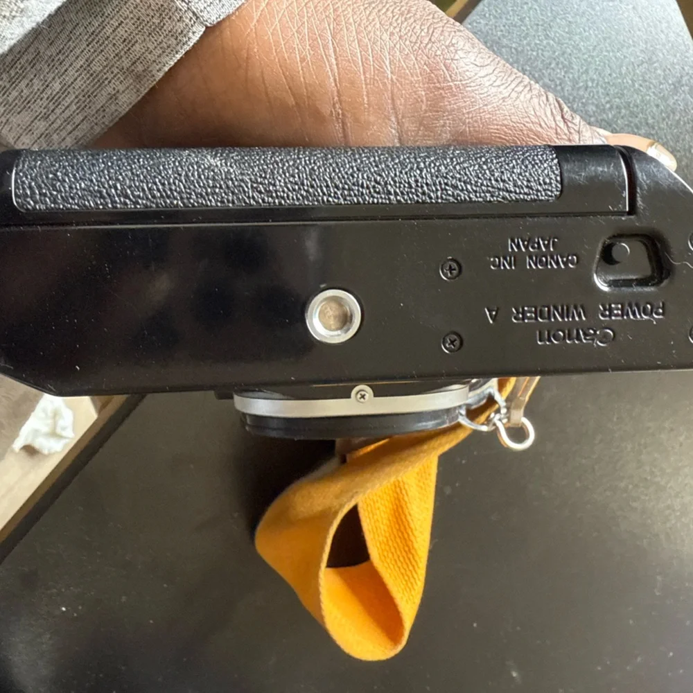 Canon AE-1 Camera with Yellow Strap